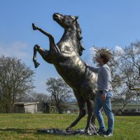 "Fargo" Rearing Horse Sculpture with Male for Scale 