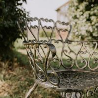 Close up of Heart Detailing on Brushed Gold "Lumley" Rocking Chair 
