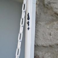 Close up of rustic detailing and chain 