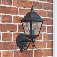 "Sheringham" Traditional Black Bottom Fix Wall Lantern on a Brick Wall
