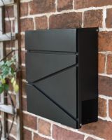 Side Of The Black Leading Edge On The Wall Mounted Post Box
