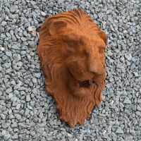 Side View of Cast Iron Lion Sculpture