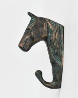 Side view of animal bust coat hook