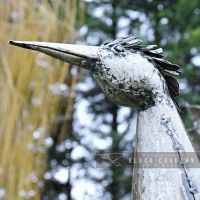 Close-up of the Face of the Crane Sculpture