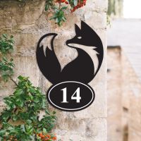 Simplistic Fox Iron House Number Sign in Situ on a House