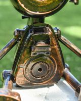 Close up of Sitting Robot Recycled Metal Sculpture body