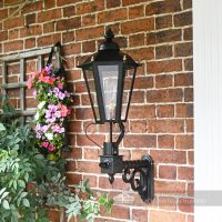Six Sided Victorian Black Wall Light On Brick Wall