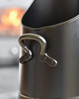 Close-Up of Handle on Sleek Black Coal Hod