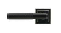 Sleek Black Textured Unsprung Lever Door Handle on Square Rose