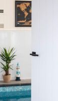 Sleek Black Textured Unsprung Lever Door Handle on Square Rose on Door