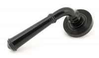 Sleek Midnight Black Lever Door Handle on Beehive Rose
