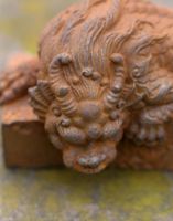Close-up of Cast Iron Sleeping Dragon Sculpture