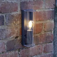 Slim Curved Wall Light in Situ on a Brick Wall