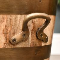 Close-up of the Bronze Handles on the Side of the Log Holder