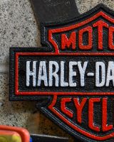 Close up of Small Harley Davidson Cycles Vintage Style Cast Iron Sign finish