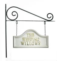 White Arched Hanging Sign on Wall Mounted Bracket