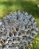 Close up of Rustic Bedspring Sheep Sculpture spring coat
