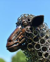 Close up of Rustic Bedspring Sheep Sculpture face detailing