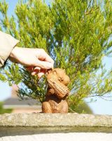 Scale image of Miniature Rustic Squirrel Sculpture