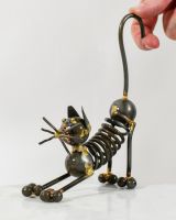 Scale of scrap metal art sculpture