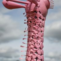 Close-Up of Pink Steel "Lady Jengo" Baby Giraffe Sculpture