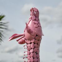 Close-Up of Steel "Lady Jengo" Baby Giraffe Sculpture - Pink
