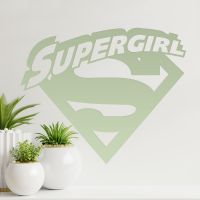 "Supergirl" Wall Art Among Plants in the House