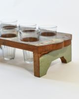Close up of rustic side detail on recycled wood tea tray