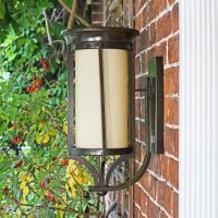 Side View of the "Thaynwick" Large Cream and Bronze Wall Mounted Lantern Flush on a Brick Wall