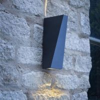 "The Architect" Anthracite Angled Wall Light in Situ on a Stone wall
