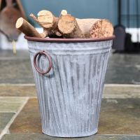 Steel "The Burley" Vase Log Basket in Use Holding Logs
