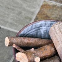 "The Burley" Vase Log Basket Holding Logs