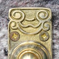 Close up of ornate detailing on doorbell 