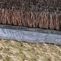 Close up of brush and cast iron base 