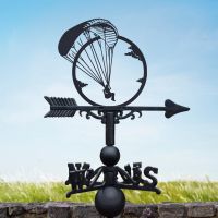 Black Paragliding Weathervane in Open Skies 