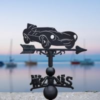 Jaguar D-Type Weathervane in View by a Dock