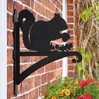 Squirrel Hanging Basket Bracket in Situ on a Brick Wall