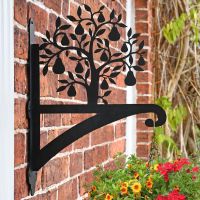 Pear Tree Hanging Basket Bracket on a Brick Wall in the Garden