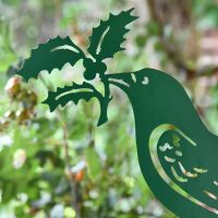 Close-up of the Raven Holding Holly Design on the Bracket