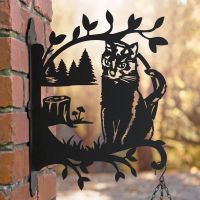 Alpine Trees and Stalking Cat Hanging Basket Bracket at Sunset