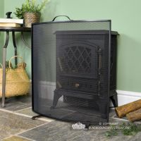 Black Curved Custom Fire Screen in Situ Next to the Fire Place