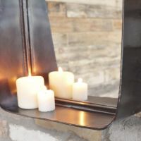 Close up of shelf on mirror 