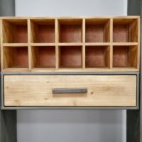 Close up of bottle holder and drawer 