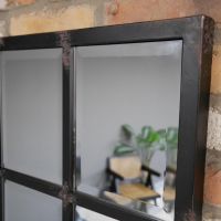Close up of metal frame and rustic black finish 