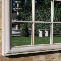 Close up of corner of Rustic Cream Arched Garden Mirror 