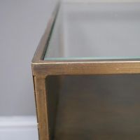 Close up of burnished gold finish on metal frame