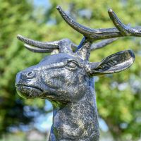 Side profile of Gold & Black Stag Sculpture 