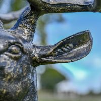 Close up of ear detailing on Black & Gold Stag Sculpture 