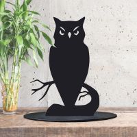 Black Owl Silhouette Ornament in Side in the Conservatory 