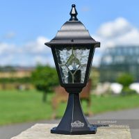 Traditional Leaded Glass Pillar Light Sitting on a Brick Pillar